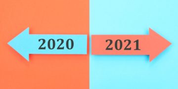 Arrival of new year 2021 and the passing of year 2020 with arrow signs. Arrival of new year 2021 and the passing of year 2020 with arrow signs.
