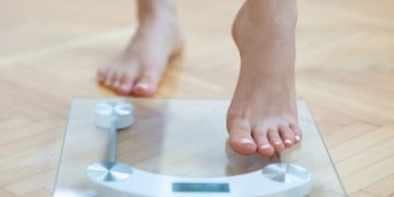 Female feet weighing scale Female feet weighing scale